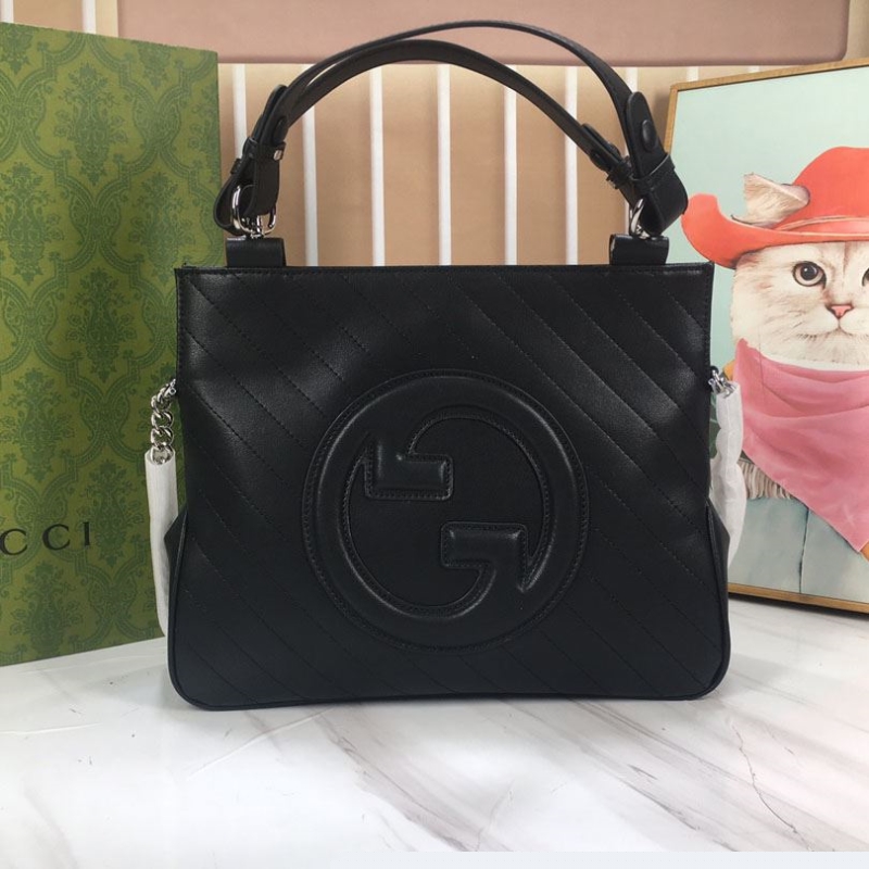 G*u*i top handle bags